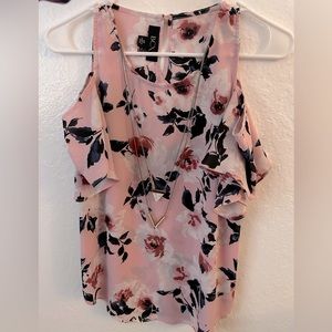 BCX floral top with a necklace